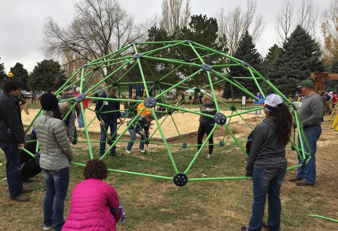 Volunteers help build a playground in Pueblo, Colorado